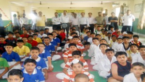 Players posing for a group photograph along with officials during Taekwondo Championship at Humanity Public School in Samba.