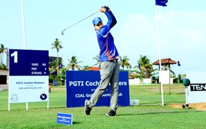 Golfer Mahindra Singh executing a big heave while aiming at a target during a golfing event prior to his participation in Surya Nepal Masters.