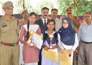 Winners of debate competition posing along with dignitaries in Jammu on Tuesday.
