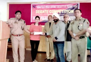 Winner of debate competition being felicitated by the dignitaries at Batote on Tuesday.