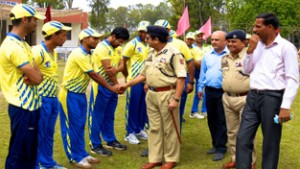 DIG Jammu Shakeel Ahmed Beig interacting with players of BCC Bulls at GGM Science College Hostel ground in Jammu.
