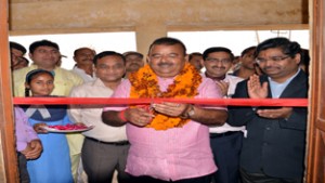 Chander Prakash Ganga inaugurating renovated part of a Government School. 