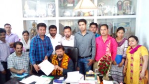A delegation of Homoeopathy doctors submitting memorandum to Health Minister Lal Singh in Jammu.