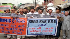 Sunil Dimple, president, Jammu West Assembly Movement along with other activists raising slogans in support of their demands on Monday.
