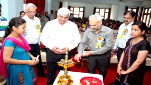 JU VC Prof RD Sharma lighting ceremonial lamp at inaugural of national seminar on Saturday.
