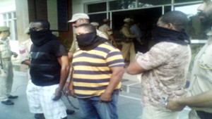 Arrested online fraudsters at police station Gandhi Nagar.