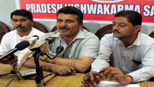 Representatives of Vishwakarma Sabha talking to reporters at Jammu on Tuesday. -Excelsior/Rakesh