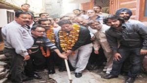 Rajesh Gupta, MLA Jammu East with JMC Commissioner kick starting development of lane in Ward No 2 on Wednesday.