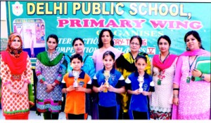 Winners of Story Telling Competition’ posing for group photograph.