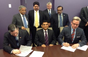 MD, NSDC, Dilip HM Chenoy and Associate vice-president, Corporate Training Soluting, SAIT, Canada, signing an MoU on skill development at Ottawa in Canada. 