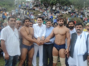Winner of Domel Dangal title being declared by the dignitaries on Monday.