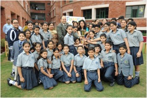 Students of Heritage School posing for a group photograph during Founder’s Day celebration on Monday.