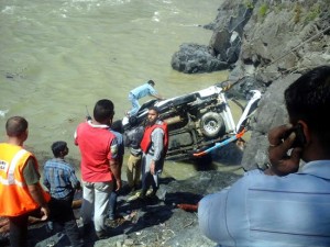 Ill-fated vehicle being pulled out of river Chenab in Ramban district on Saturday.