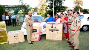 DGP K Rajendra Kumar distributing prizes among the winners of 25th Police Public Mela at Gulshan Ground in Jammu on Thursday.