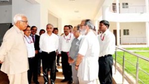 Governor N N Vohra inspecting upcoming infrastructure at SMVDIME, Kakryal on Saturday.