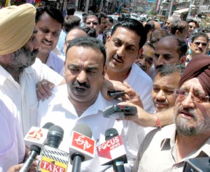 Chamber president Rakesh Gupta addressing a press conference in Jammu on Wednesday.   —Excelsior/Rakesh