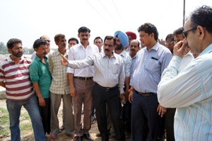 MLA Jammu East, Rajesh Gupta and JMC Commissioner Soujanya Sharma during tour to Ward No. 19 on Monday.