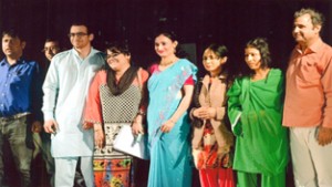 Artists of play ‘Mallika-e-Ghazal’ posing for group photograph.