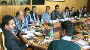 Minister for Public Works, Mohammad Altaf Bukhari chairing  a meeting at Srinagar on Saturday.
