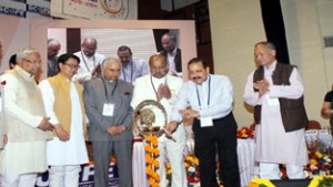 Union Minister Dr Jitendra Singh lighting the traditional lamp to declare open 64th Plenary Meeting of  North-Eastern Council (NEC) at New Delhi.