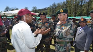 GOC-in-C, Northern Command, Lt Gen DS Hooda interacting with an ex-serviceman during a Defence Pension Adalat held at Udhampur.