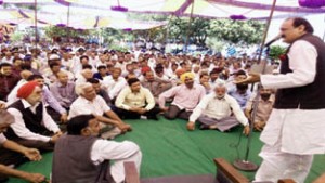 Surjit Singh Slathia addressing a rally at Gurah Morh.