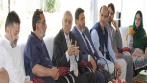Chief Minister, Mufti Mohd Sayeed chairing a meeting at Srinagar on Sunday.