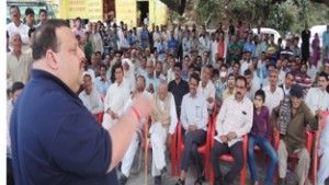 Provincial President NC, Devender Singh Rana addressing a public meeting at Nagrota on Sunday.