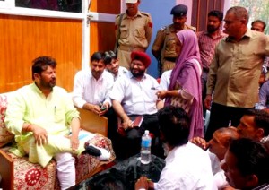 Minister for Health & Medical Education Ch Lal Singh interacting with people on Wednesday.