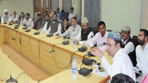 Minister for CA&PD, Choudhary Zulfkar Ali interacting with representatives of tribals at Jammu on Friday.
