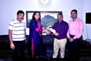 CCI president Rakesh Gupta and Ms Khair Ul Nisa, Director, WTC Services India Head exchanging MoU documents during meeting in Jammu on Wednesday.