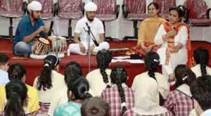 An artist performing during inaugural session on Wednesday.