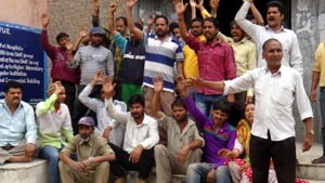 Safai Karamcharis protesting for regularization at Udhampur on Sunday.