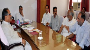 Deputy Chief Minister Nirmal Kumar Singh chairing a meeting of Housing and Urban Development Department on Monday.