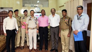 ADGP SM Sahai and others posing for a photograph.