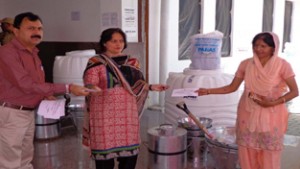 District Development Commissioner, Samba, Sheetal Nanda distributing dairy equipments and Mastitis Kits to farmers at Samba on Friday.