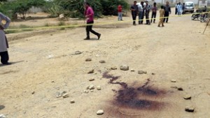 Blood stains at the site of attack on bus in Karachi on Wednesday.