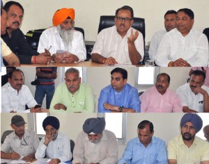 Deputy Chief Minister Dr Nirmal Singh meeting with representatives of PoJK refugees in Jammu on Saturday.