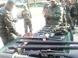 Arms and ammunition recovered by Army in Tanghdar on Saturday. 