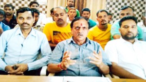 NMC president Subash Shastri talking to reporters at Jammu on Saturday.