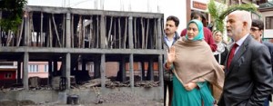Minister for Education, Naeem Akhtar being briefed on the repair and renovation work at Govt. College for Women Nawakadal on Monday.