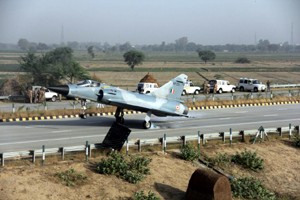 An IAF jet landing at Yamuna Expressway near Mathura on Thursday.