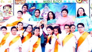 Winners of Inter-House Semi-classic Singing Competition posing for a group photograph at DPS in Jammu.