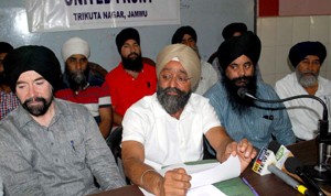 Sikh United Front leader Avtar Singh Khalsa and others addressing joint press conference in Jammu on Friday.  —Excelsior/ Rakesh