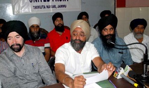 Sikh United Front leader Avtar Singh Khalsa and others addressing joint press conference in Jammu on Friday.  —Excelsior/ Rakesh