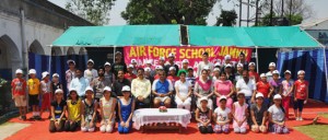 Campers posing along with dignitaries and officials at Air Force School in Jammu.