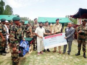 Cash prize being presented to the winners of Shah-e-Hamdan Cricket Tournament.