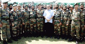 Defence Minister Manohar Parrikar and Army chief Gen Dalbir Singh with Army Commanders and jawans on LoC in Poonch on Saturday. Another pic on page 4.