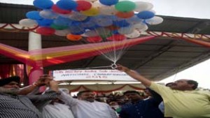 Minister for Sports, Imran Raza Ansari releasing balloons while declaring open 5th Sub Jr National Hockey Championship alongwith ADGP SM Sahai and DG Sports Navin Agarwal in Jammu on Wednesday.      —Excelsior/Rakesh