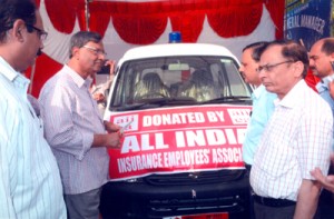 AIIEA members donating ambulance to GMCH Jammu on Monday.